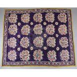 A large purple silk Suzani, c.1880, possibly from Tajikistan, embroidered in silk thread with