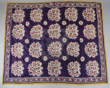 A large purple silk Suzani, c.1880, possibly from Tajikistan, embroidered in silk thread with