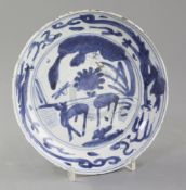 A Chinese late Ming kraak blue and white dish, Wanli period, the centre painted with two deer in a