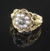 A Georgian gold, diamond and split pearl mourning ring, with carved and pierced shoulders, the