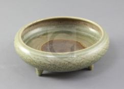 A Chinese Longquan celadon censer, Ming dynasty, 15th / 16th century, the compressed globular body