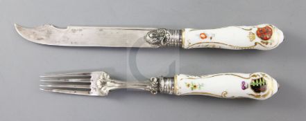 A rare Meissen porcelain handled silver knife and fork, from the 'Coronation Service', c.1733/4. the