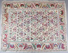 A late 19th century / early 20th century Caucasian directional patterned Suzani, made from four