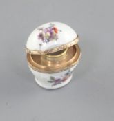 A Meissen porcelain thimble case, c.1750, painted with floral sprays to the domed cover and