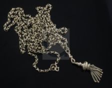 A Victorian 15ct gold guard chain with gold tassel pendant, gross 28 grams, 146cm.