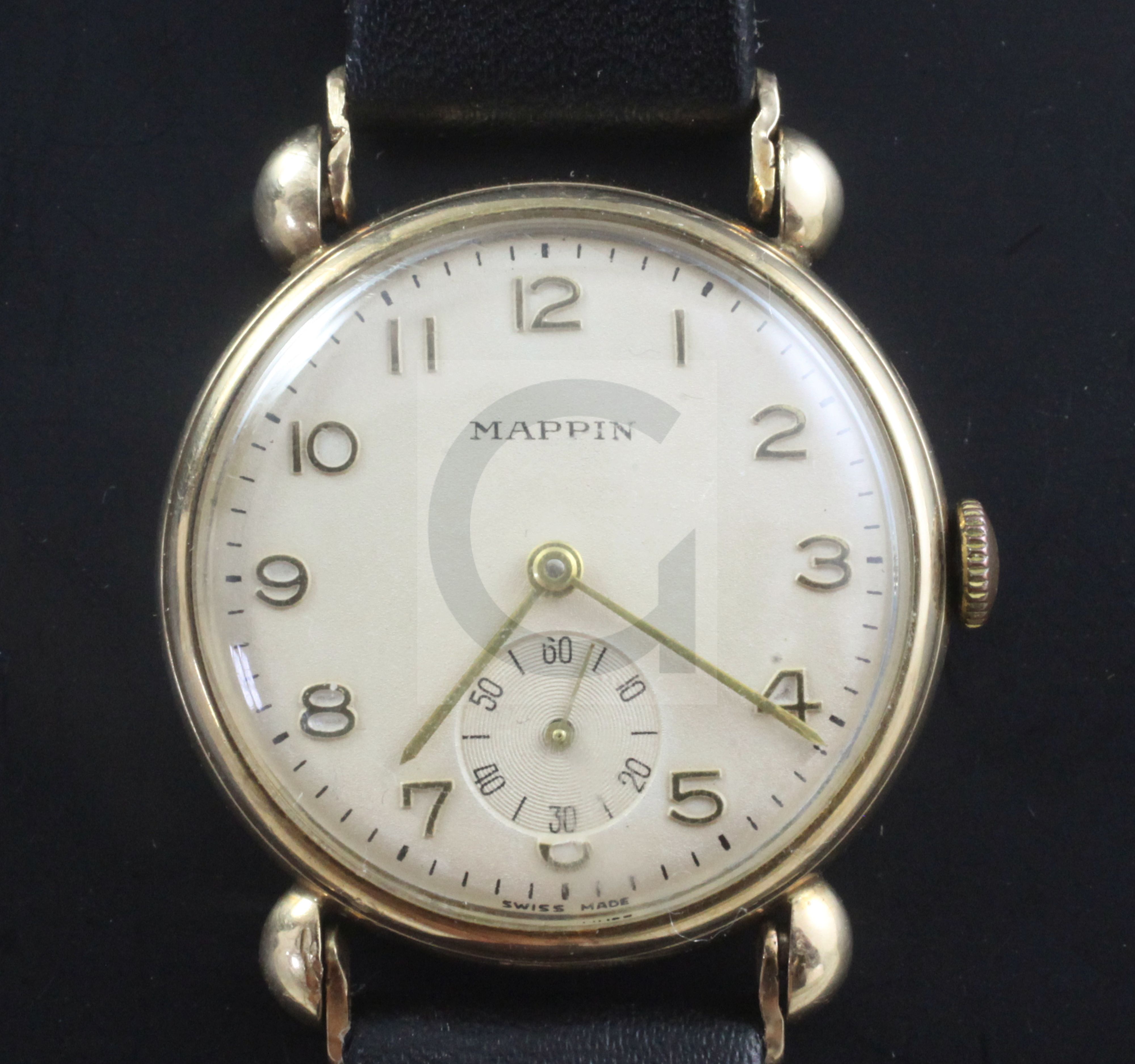 A gentleman's 1950's 9ct gold manual wind wrist watch, retailed by Mappin, with Arabic dial and