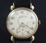 A gentleman's 1950's 9ct gold manual wind wrist watch, retailed by Mappin, with Arabic dial and