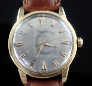 A gentleman's 1950's/1960's 18ct gold Longines Conquest automatic wrist watch, with arrowhead