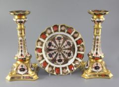 A pair of Royal Crown Derby 'Old Imari' pattern 1128 candlesticks, 10.5in., and a set of seven