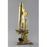 A late 19th century lacquered brass Smith and Beck monocular microscope, in original fitted case