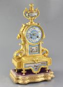 A mid 19th century French porcelain mounted ormolu mantel clock, Henry Marc, Paris, the foliate