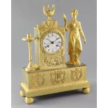 A second quarter of the 19th century French ormolu mantel clock, modelled with an allegorical female