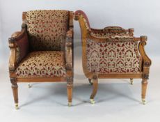 A pair of Victorian style mahogany armchairs, with carved frames, gilt and claret fabric upholstered