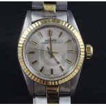 A lady's 1980's gold and steel Rolex Oyster Perpetual wrist watch, with baton numerals, model no.