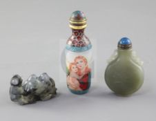 A Chinese celadon jade snuff bottle, an agate model of a camel and an enamelled glass snuff