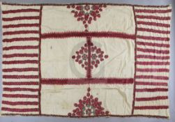 A late 19th century silk and cotton Caucasian Suzani with central divided field and floral row