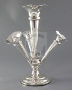 A George V silver epergne, with three removable trumpet shaped receivers, maker's marks rubbed,