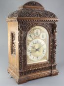 A late 19th century German quarter chiming bracket clock, Winterhalder and Hofmeier, the carved