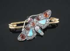 A late Victorian style gold, white opal, rose cut diamond and gem set bug bar brooch, modelled as