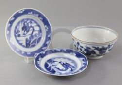 A Chinese Ming blue and white 'fish' bowl, 16th century and a pair of Kangxi leaping carp plates,