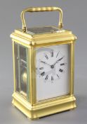 A late 19th century French gilt brass carriage clock, Margaine, the gorge case of characteristic