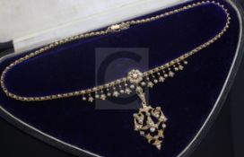 A late Victorian 15ct gold and seed pearl set pendant necklace, the detachable pendant brooch of