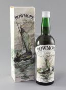 A 1960's? Sherriff's Bowmore Islay Scottish single malt whisky, with original label and box.