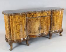 A pair of Italian walnut sideboards, with veined black marble inset tops, W.6ft 10in. D.2ft 2in. H.