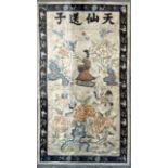 A Chinese embroidered silk panel, 19th century, woven with a four character inscription, the