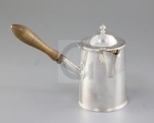 A George V Arts & Crafts silver hot milk jug, by Henry George Murphy, hallmarked London 1934, of