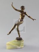 A Lorenzl Art Deco bronzed figure of a nude dancing girl, signed in the bronze, on green onyx