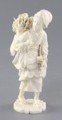 A Japanese ivory figure of a female peasant, Meiji period, carrying crop on her back and in her left