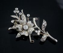 A 19th century gold, silver and diamond floral spray brooch, set with old mine and rose cut