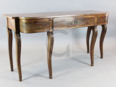 A Regency ebony strung mahogany serving table, of breakfront form, with three drawers and acanthus