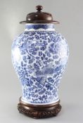 A Chinese blue and white 'phoenix and peony' jar, Kangxi period, of baluster form, profusely painted