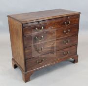 A George III mahogany chest, with brushing slide and four graduated long drawers, W.3ft 1in. D.1ft