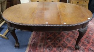 A 1920's mahogany ball and claw extending dining table W.180cm