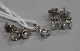 Two pairs of white gold and diamond ear studs (one 18ct, one 14ct) and an 18ct white gold and