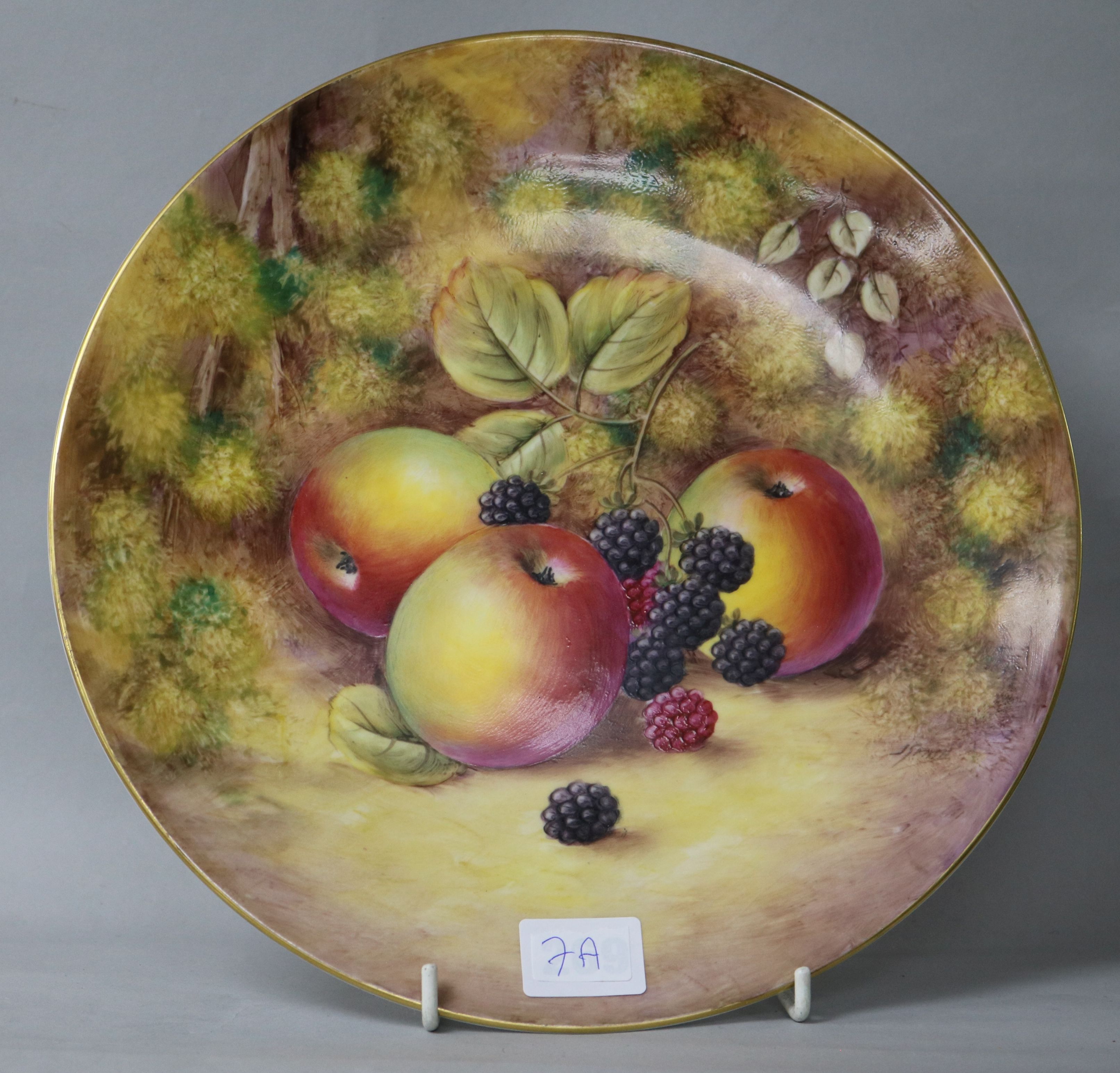 A Royal Worcester cabinet plate painted with fruit by J. Smith 27cm