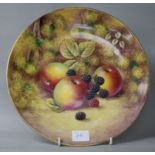 A Royal Worcester cabinet plate painted with fruit by J. Smith 27cm