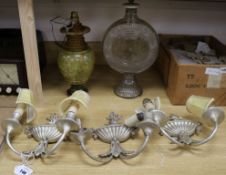 A set of three silvered wood and metal wall lights and two table lamps