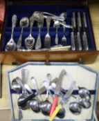 A 1930's canteen of plated cutlery and a stainless steel canteen