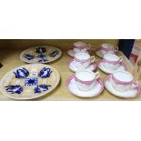 A set of six Victorian porcelain tea cups and saucers and two plates