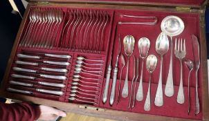 A canteen of early 20th century Portuguese 833 standard silver cutlery for twelve, comprising one