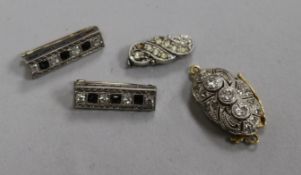 A pair of 14ct gold and gem set small bar brooches, a diamond set yellow metal clasp and a silver