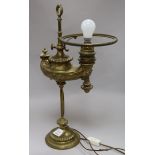 A wild and vessel of berlin patent oil lamp converted to electricity Height: 55cm