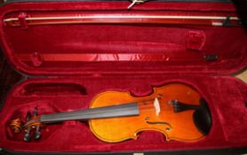 A Forenza violin and bow, in original case