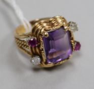 A 20th century Austrian 14ct gold, amethyst, ruby and diamond dress ring, size O.