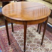A pair of mahogany demi-lune side tables width 91cm