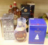 A mixed parcel of whiskies, etc. including Chivas Regal, Grant's (1.5l), Dimple, Dewar's and a